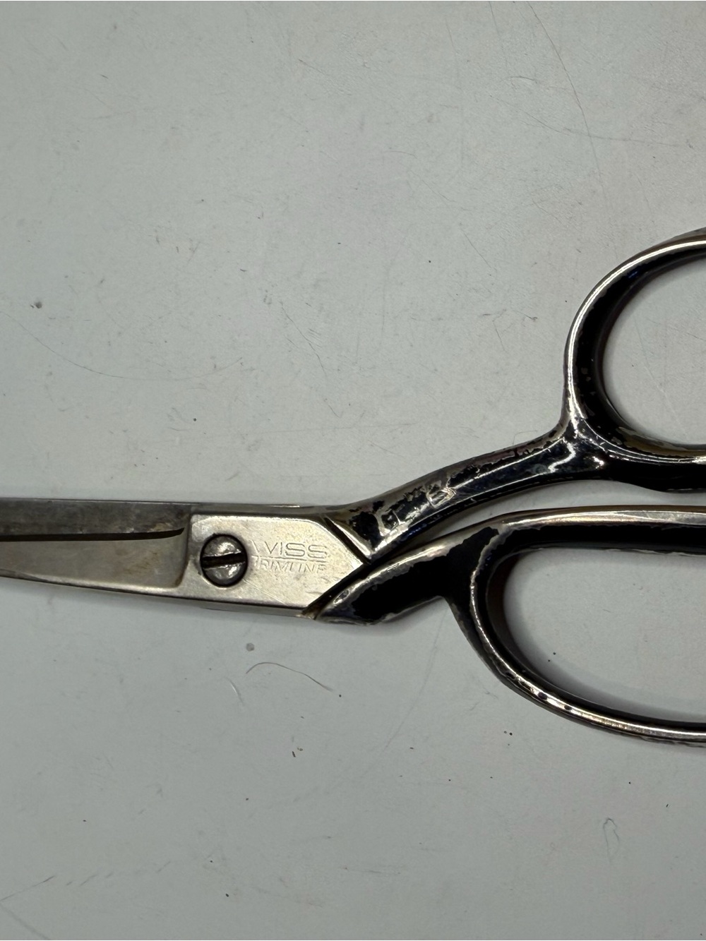 vintage Wiss tailor's scissors with their distinctive curved handles,